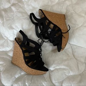 Black strappy wedge sandals